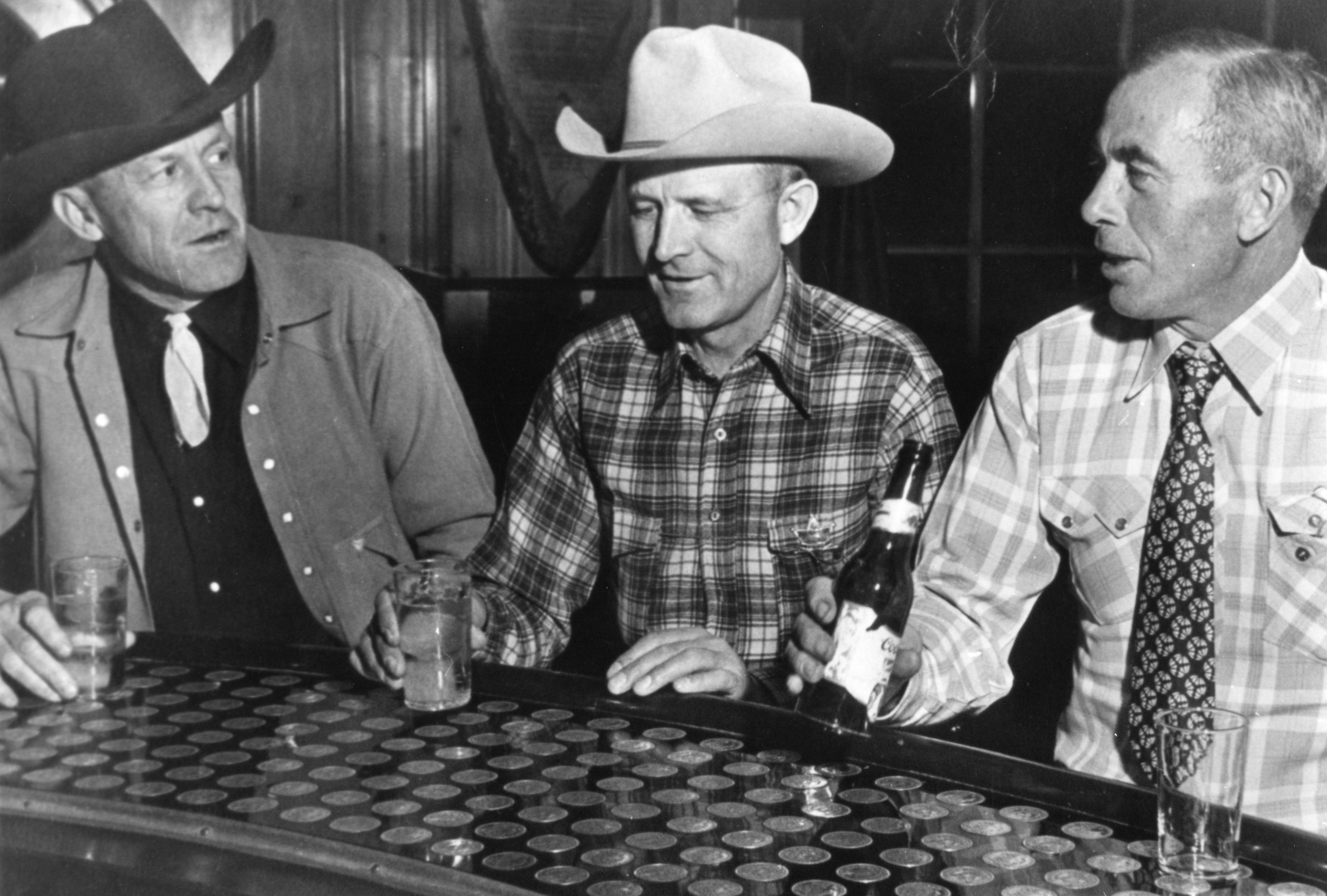 Historical Image of Patrons at The Silver Dollar Bar at The Wort Hotel, a member of Historic Hotels of America since 2002, located in Jackson Hole, Wyoming